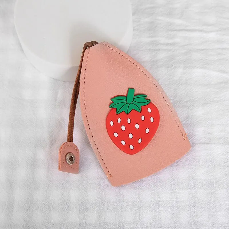 Cartoon design pull-out car key case made from soft PU leather, showing approximate size.