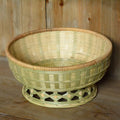 Handmade woven bamboo storage basket with rectangular shape and natural texture