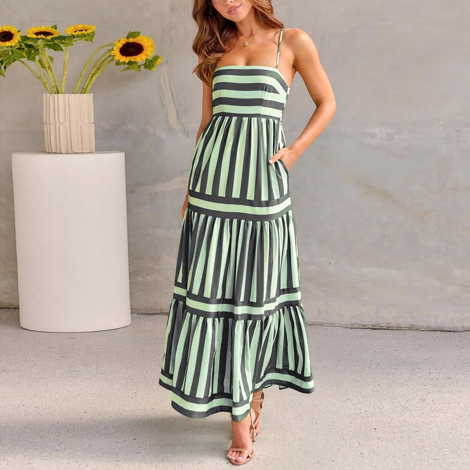 Women's striped long summer dress with suspenders, a square neck, backless design, and side pockets.
