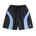 Quick-drying black and grey sports shorts with elastic waistband and straight-leg fit