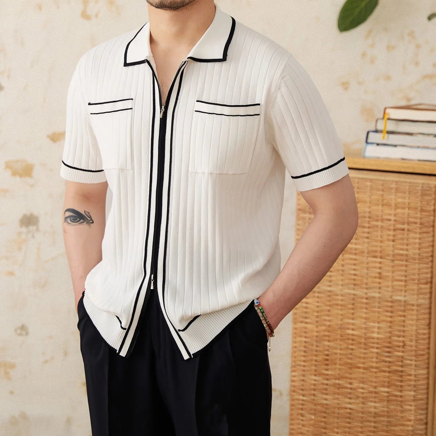 Slim elastic polo shirt with lapel collar and short sleeves in black or white colours