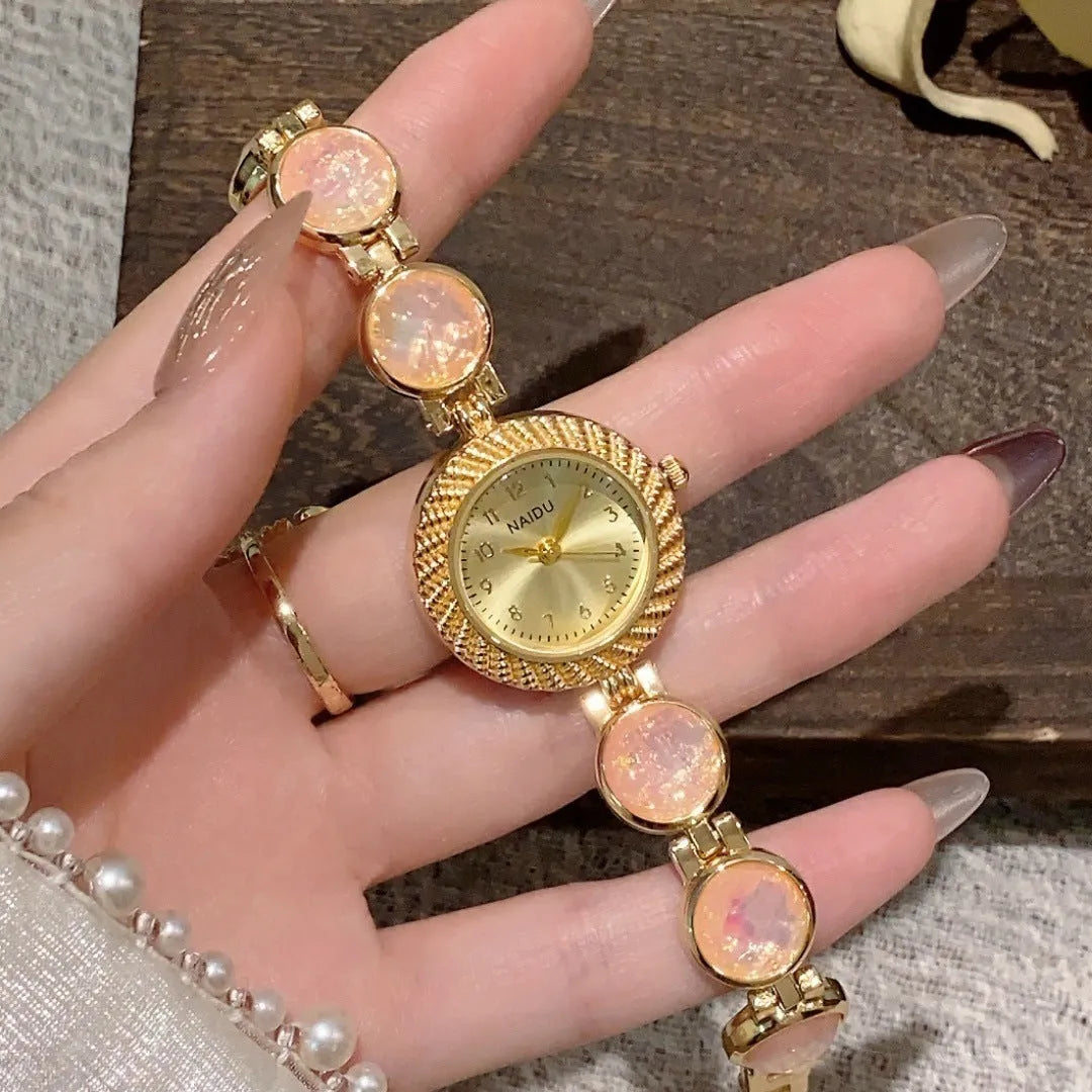 Women's quartz watch with 25mm round dial in one of six colours including milky white and dark green