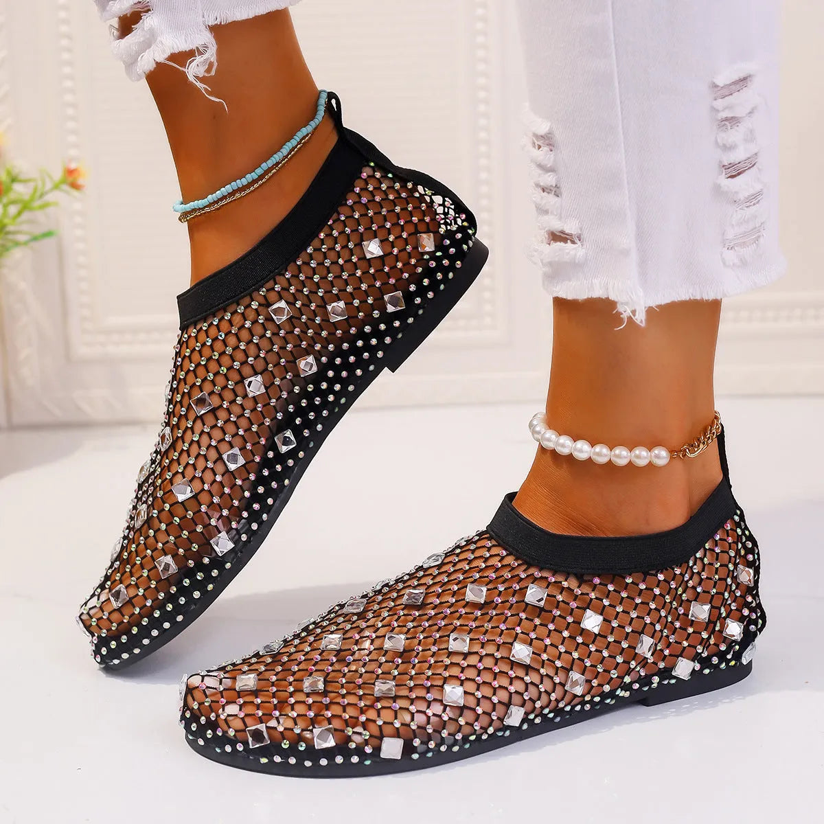 Women's flat sandals with mesh upper and colourful rhinestone decoration
