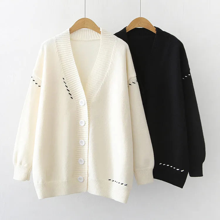 Women's loose fit knitted cardigan coat in black solid colour with long sleeves