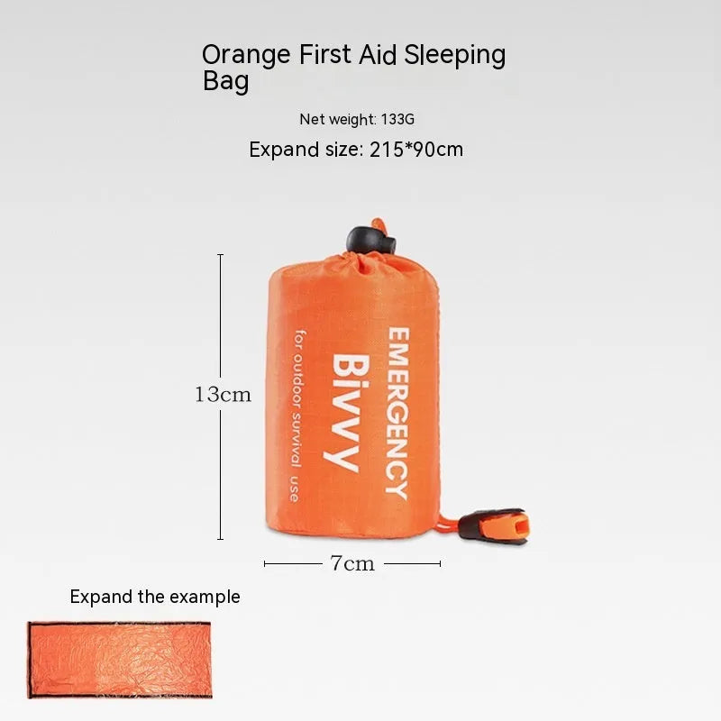 Orange portable disaster relief tent kit with sleeping bag and emergency blanket laid out.