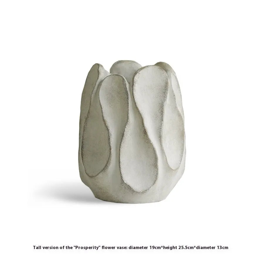 Irregular ceramic vase for flower arrangements in handcrafted design