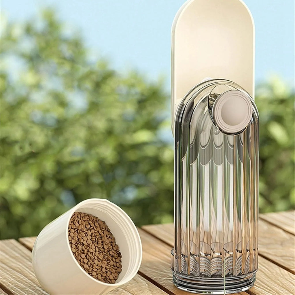 Beige foldable dog water bottle with a press-button dispenser and a small food container at the base.