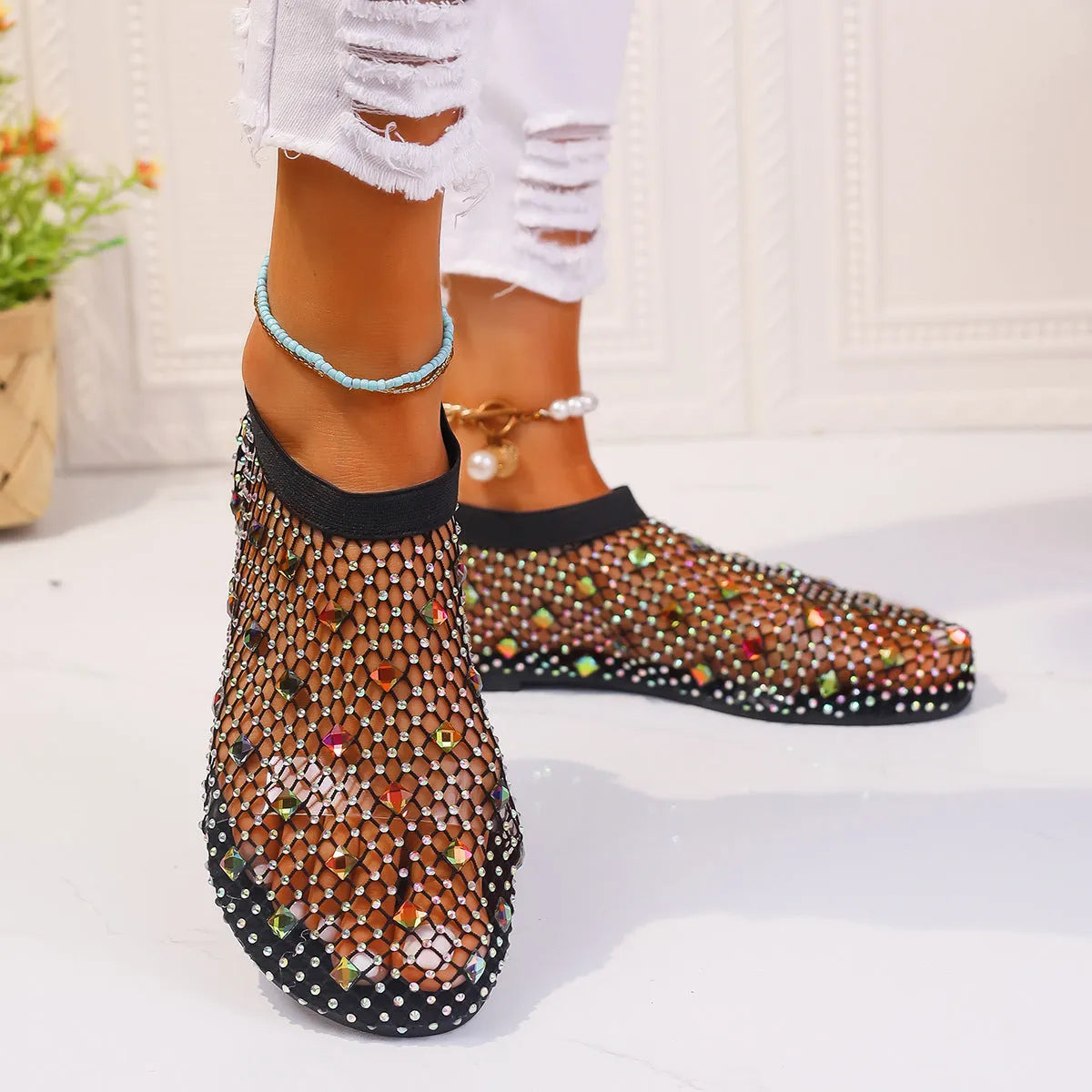 Women's flat sandals with mesh upper and colourful rhinestone decoration