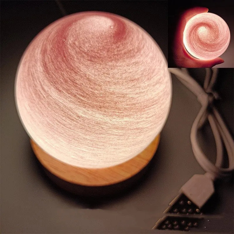 Planet-themed night light with USB cable and base, showing 80mm diameter globe