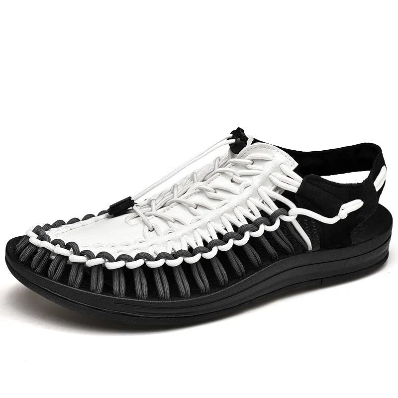 Woven Roman sandals with an elastic drawstring tie in multiple colour options on a rubber sole.