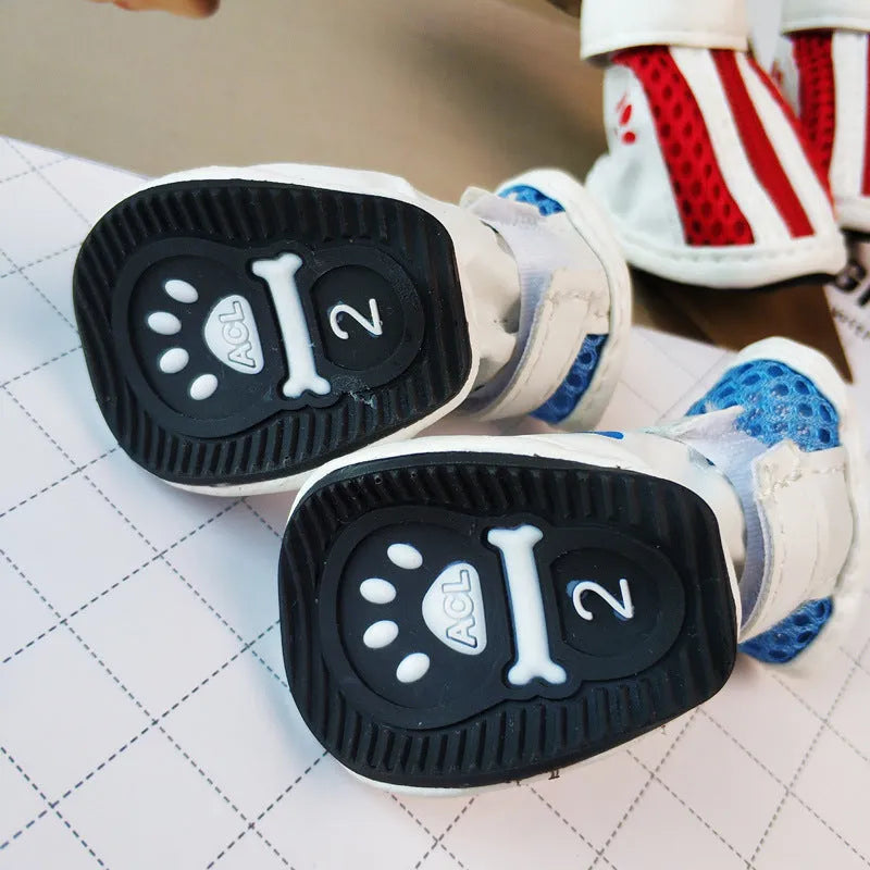 VIP-branded cloth dog sneakers with zipper closures in blue, pink or red colours