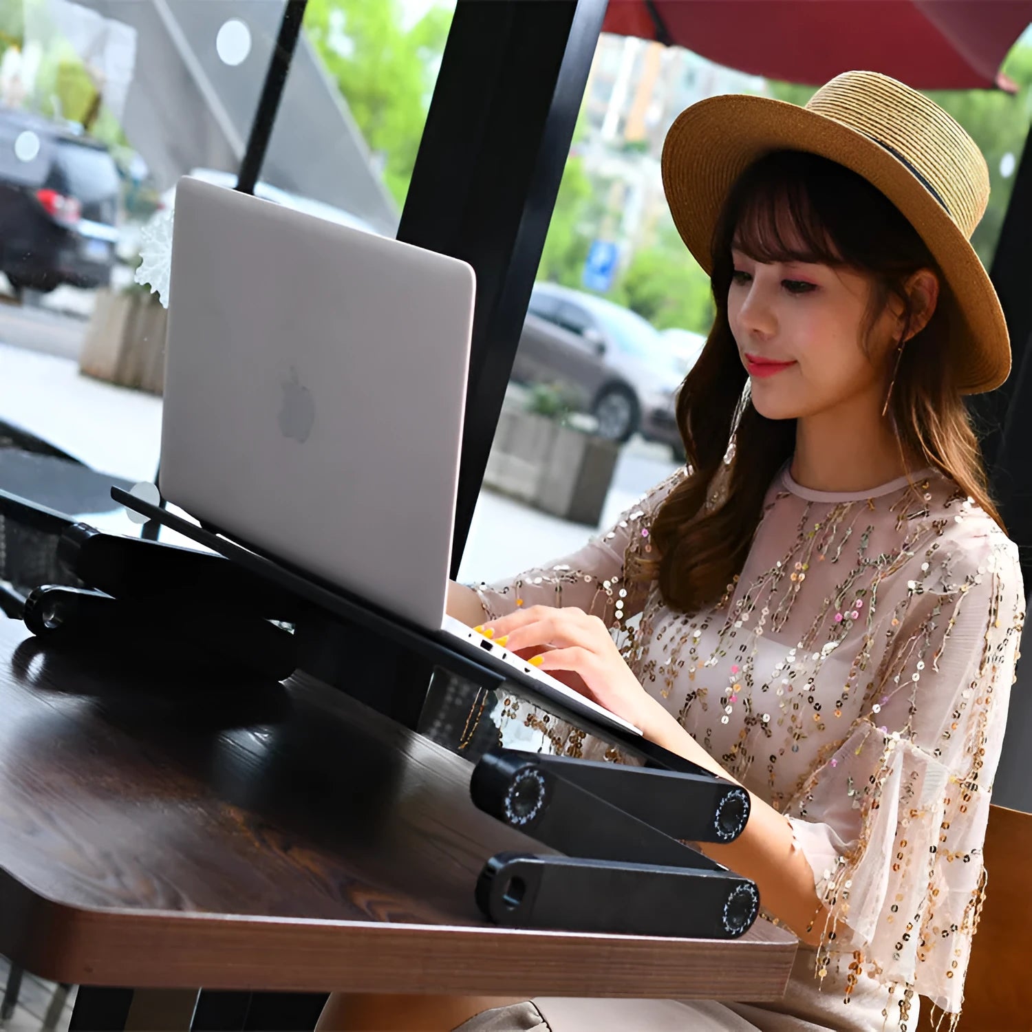 Black folding computer desk with lazy stand design extended for use