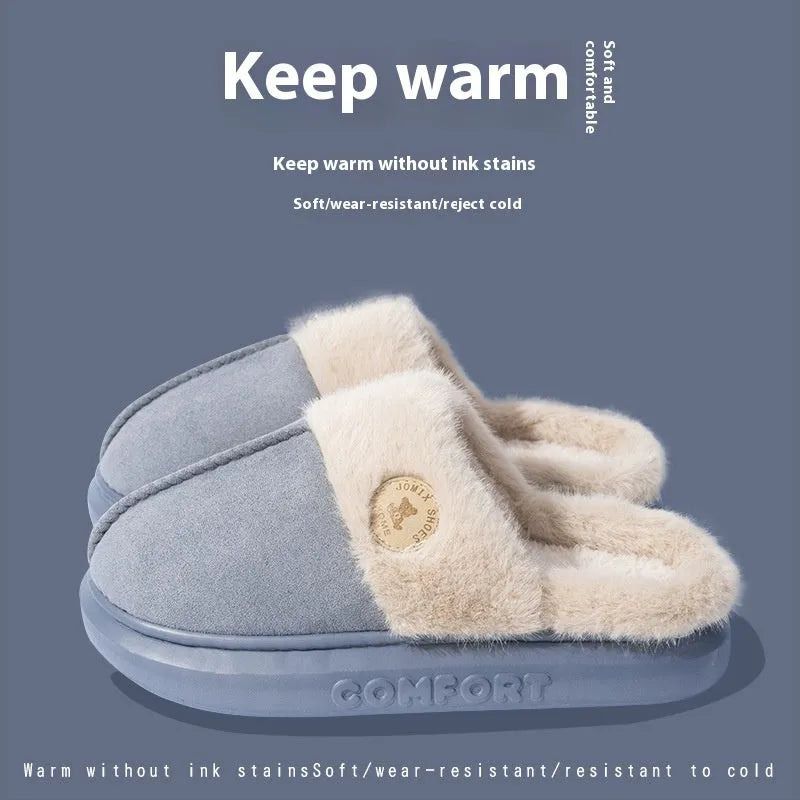 A pair of plush fleece slippers with a thick PVC sole and car stitching detail, shown in a choice of colours.