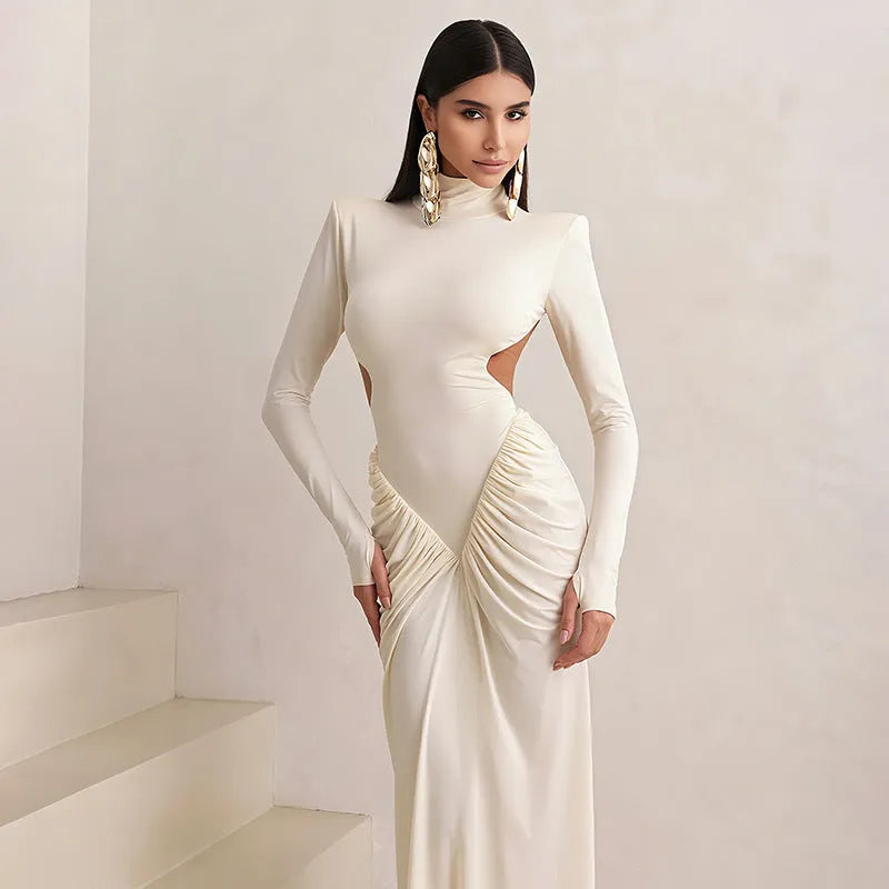 Long sleeve high collar backless dress in slim fit with pleated detailing.