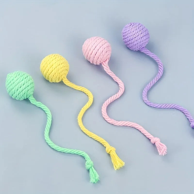 Colourful cat toy ball with rope handle and built-in bell for interactive play