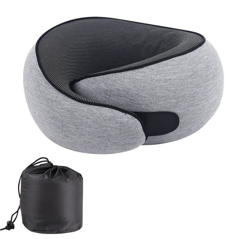 Black U-shaped memory foam travel neck pillow with storage bag, shown next to dark blue and grey colour options.