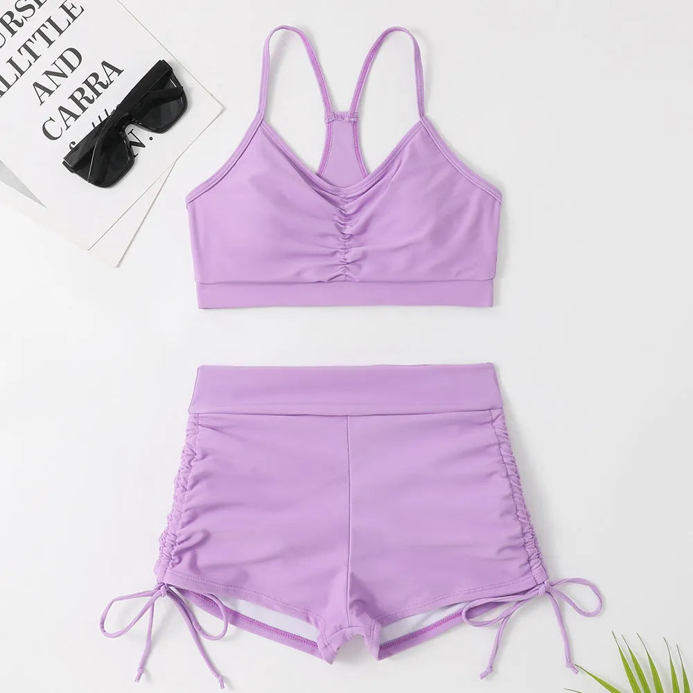 Women's high waist split swimsuit bikini in purple or black with sleeveless design