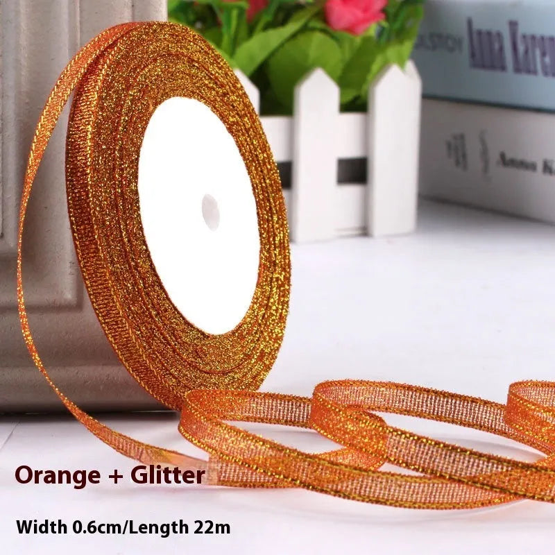 Roll of narrow 0.6cm wide polyester gift wrapping ribbon in assorted colours, showing 22 metre length.