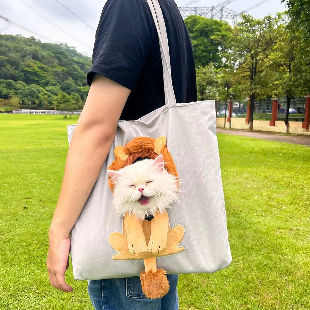 Soft canvas pet shoulder bag with cartoon pattern, shown in Light Denim colour for carrying small dogs or cats.