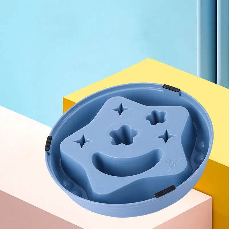 Blue star and wings design large plastic slow feeder dog bowl with maze pattern.