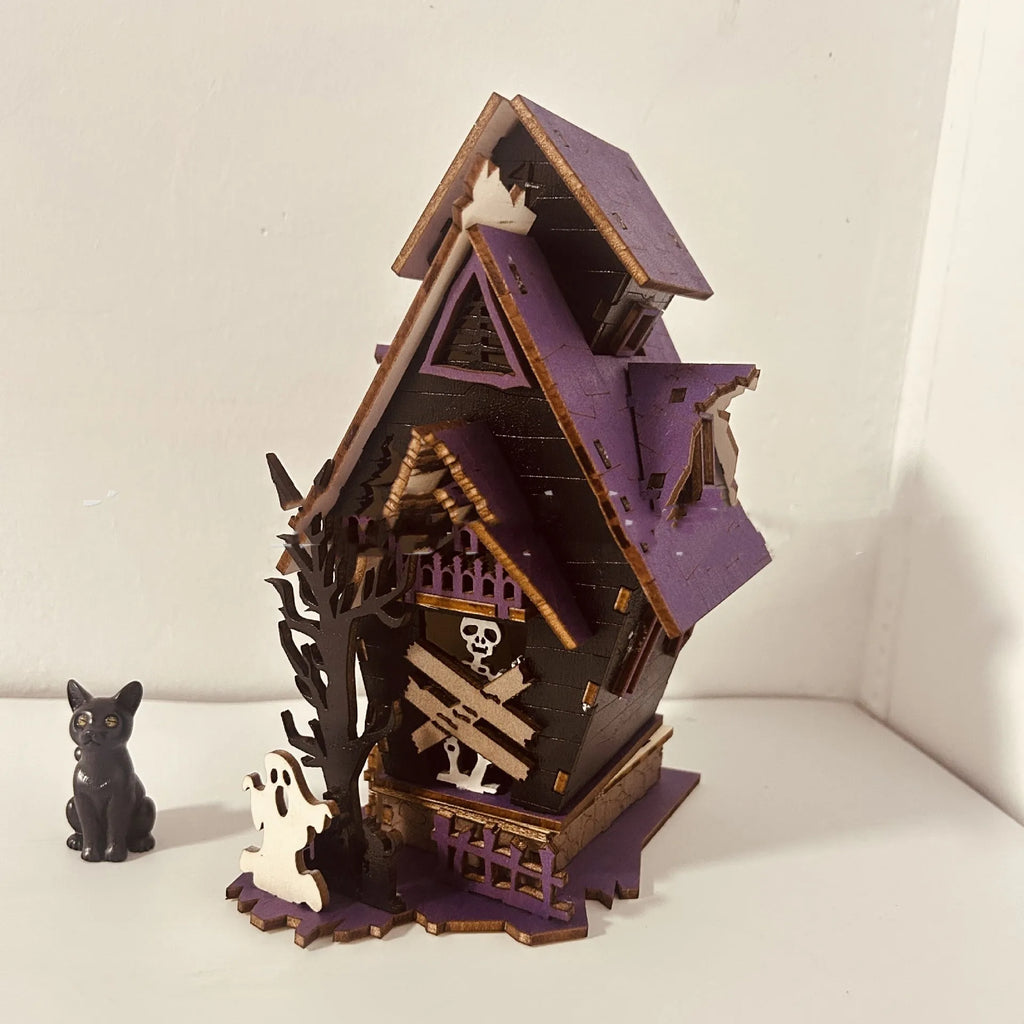 Wooden DIY haunted house decoration kit for Halloween with dimensions 14cm by 10.5cm by 19cm
