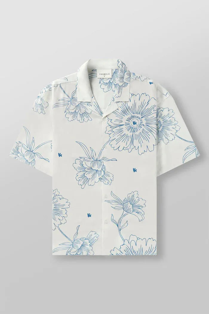 A man's loose-fitting, short-sleeve casual top with a floral print, shown in a light colour.
