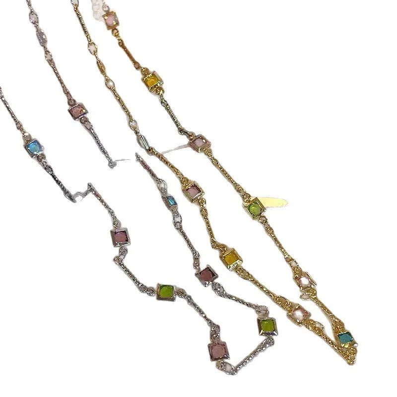 Square colour clavicle chain necklace with geometric quadrilateral links and artificial crystal detailing in gold finish