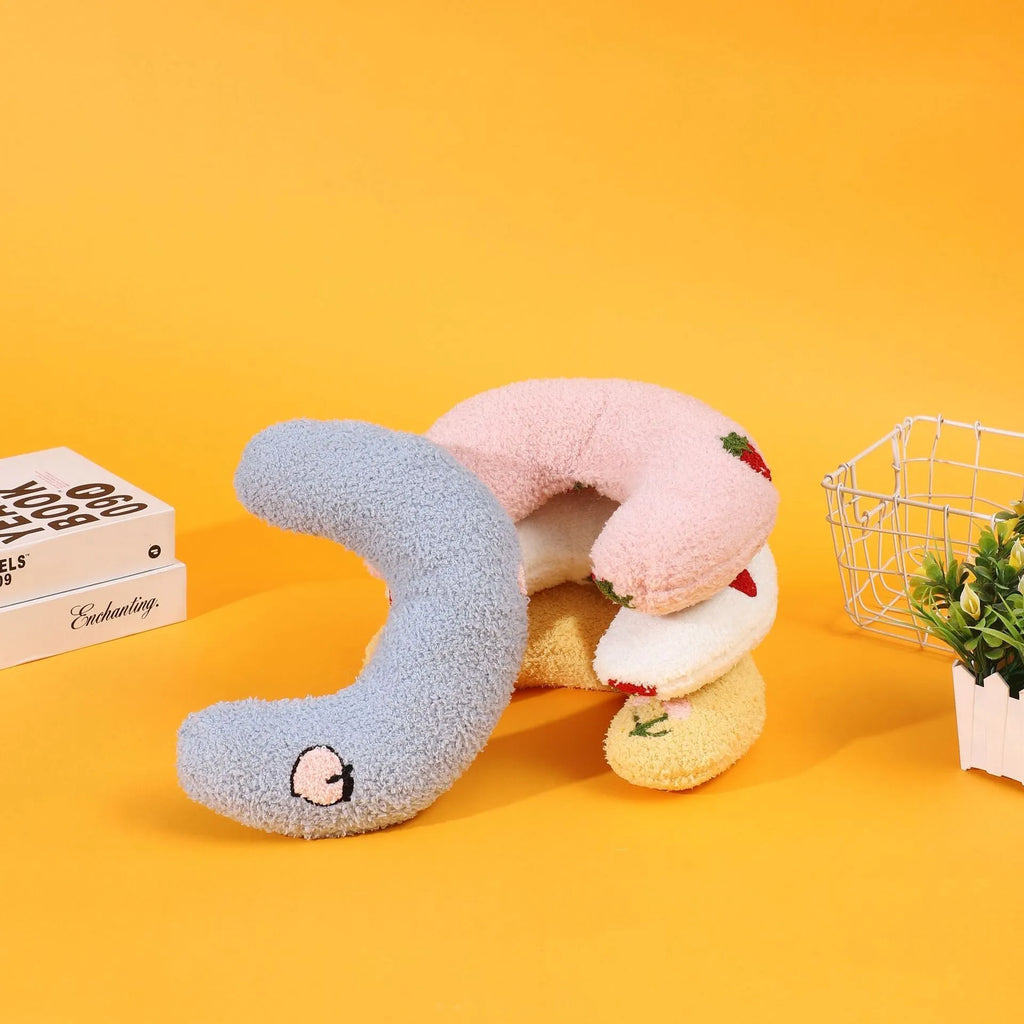 U-shaped half moon cloth pillow pet bed for cats in blue, pink, white, and yellow colours.