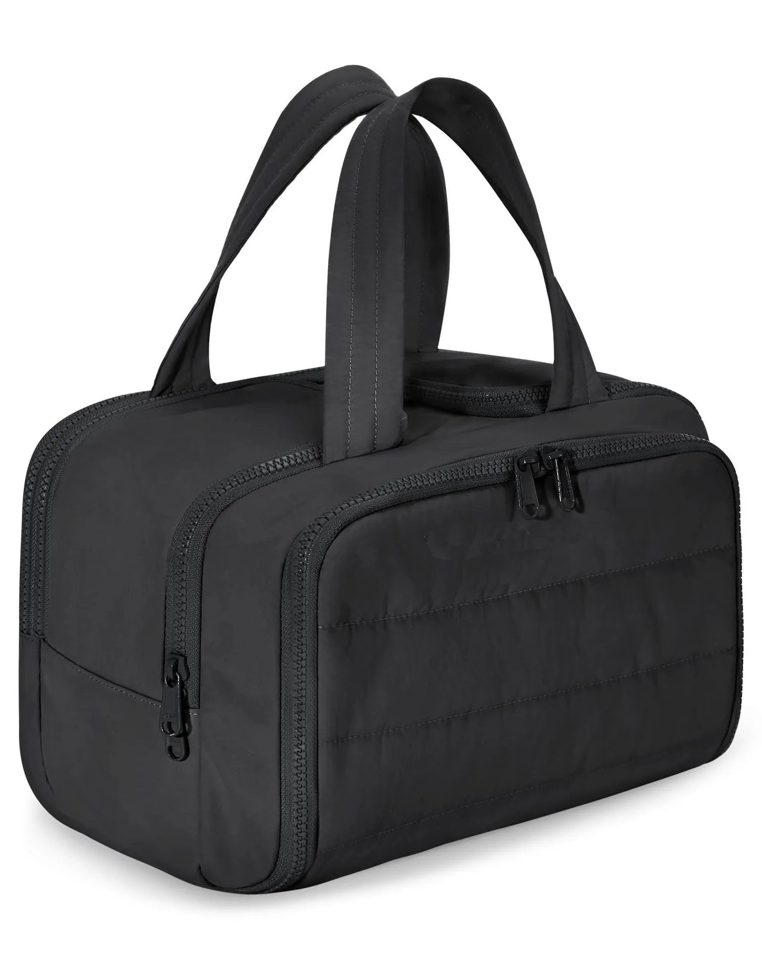 Large lightweight travel toiletry bag in beige with wide open design showing fluffy interior