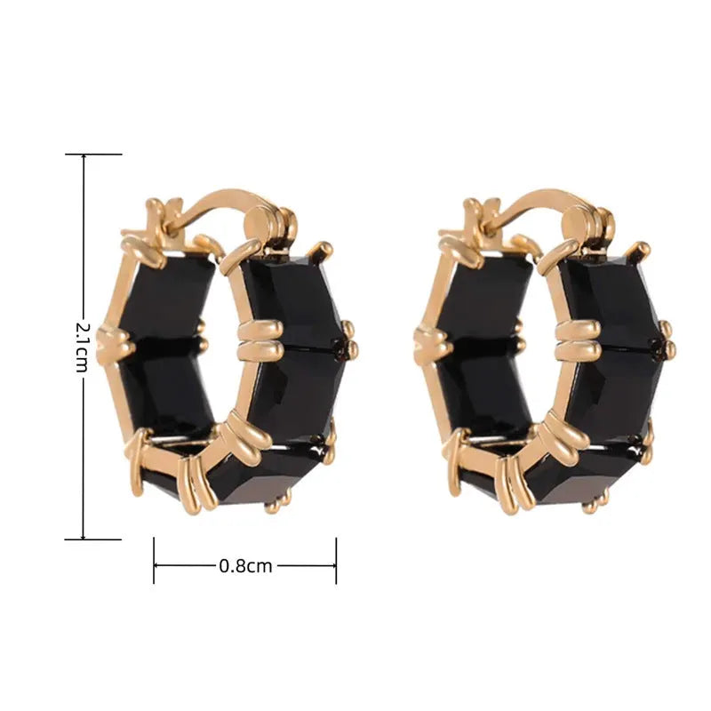 Gold geometric U-shaped women's earrings with a round black zircon stone.
