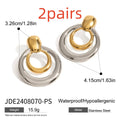 Gold geometric hollow stud earrings showing double layer round design with butterfly clutch backs