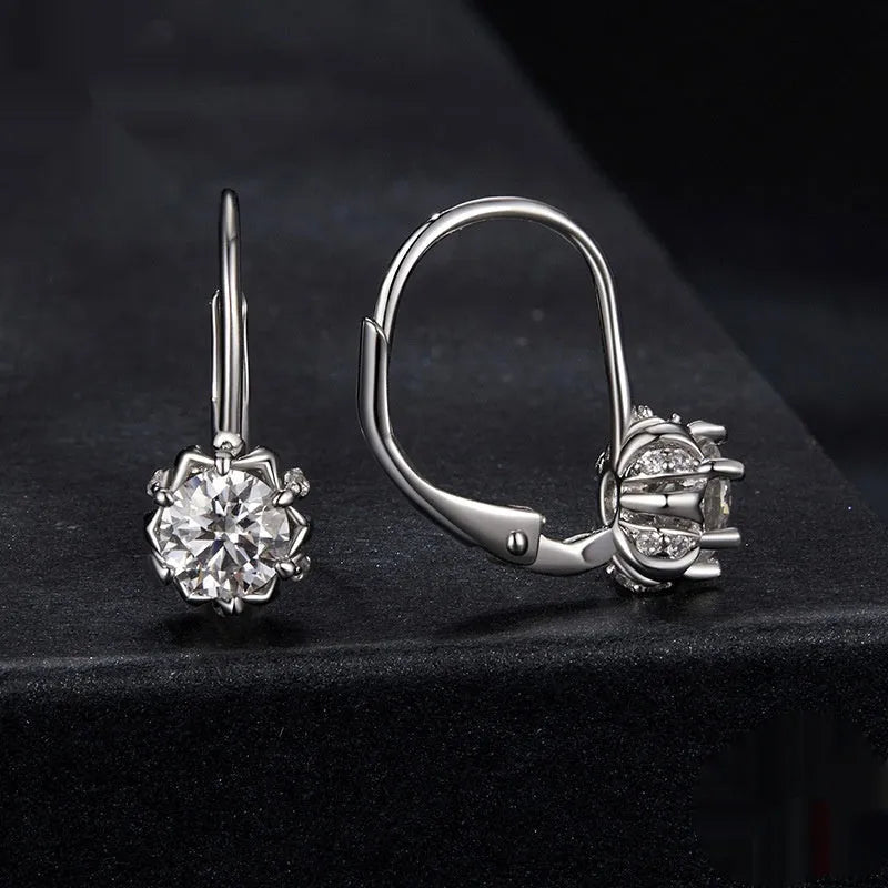 Sterling silver flower bud ear clip earrings with white gold plating and moissanite stone