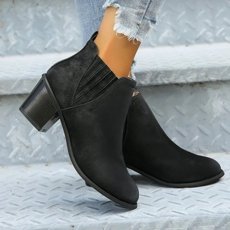 Women's black ankle boots with pointed toe and thick square heel slip-on design