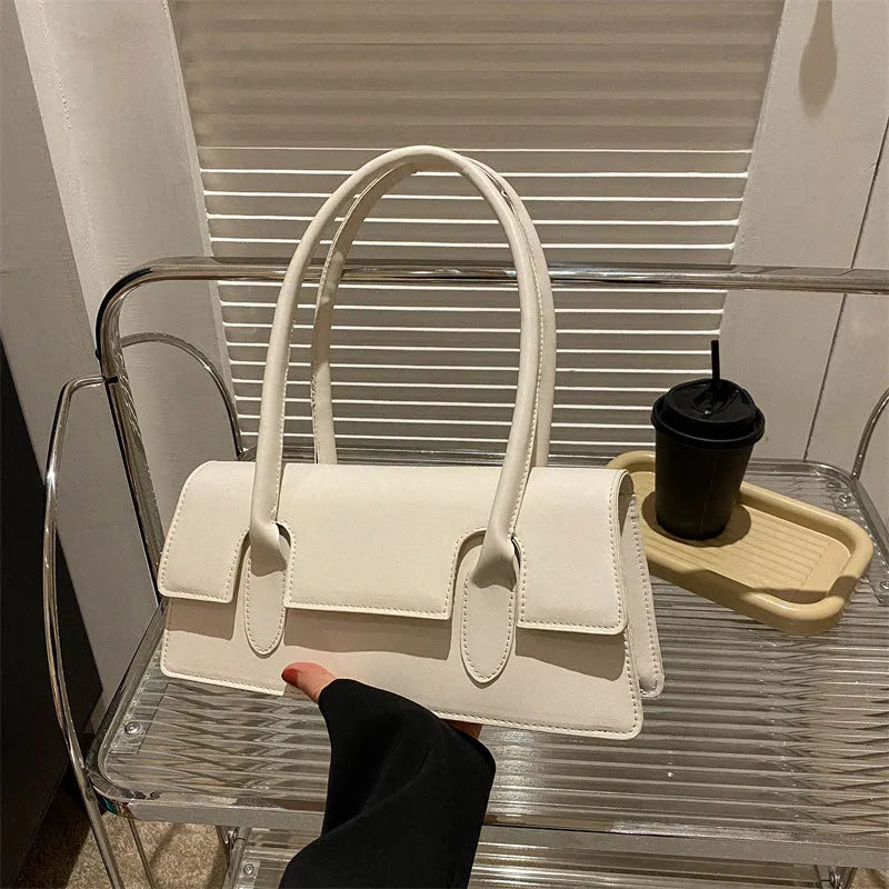 Women's retro square shoulder bag in PU leather with single strap and stitching details