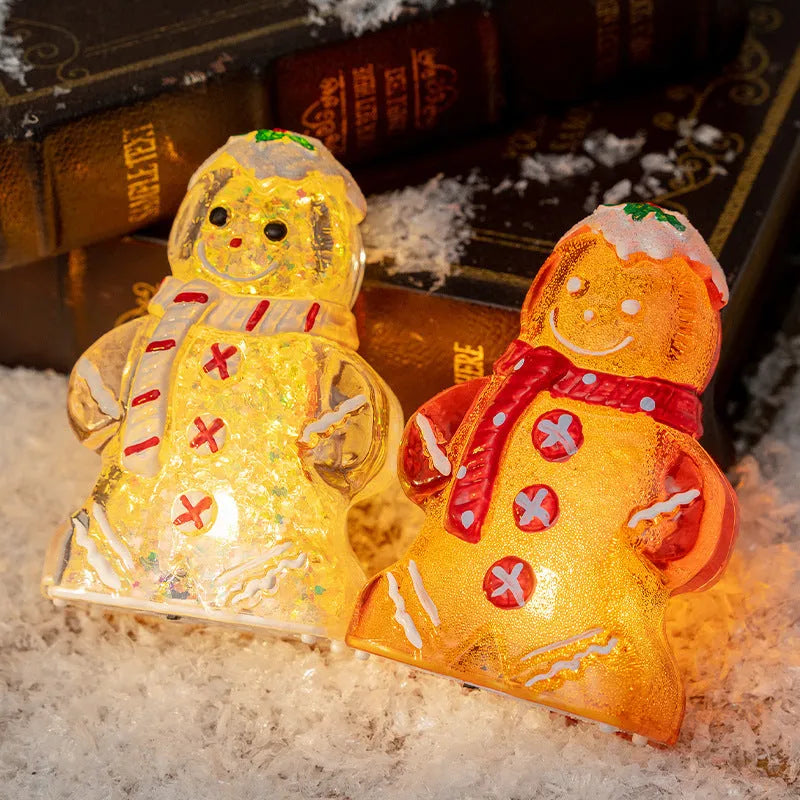 Glowing plastic gingerbread man Christmas ornament with a scarf in red, white, or transparent colours.
