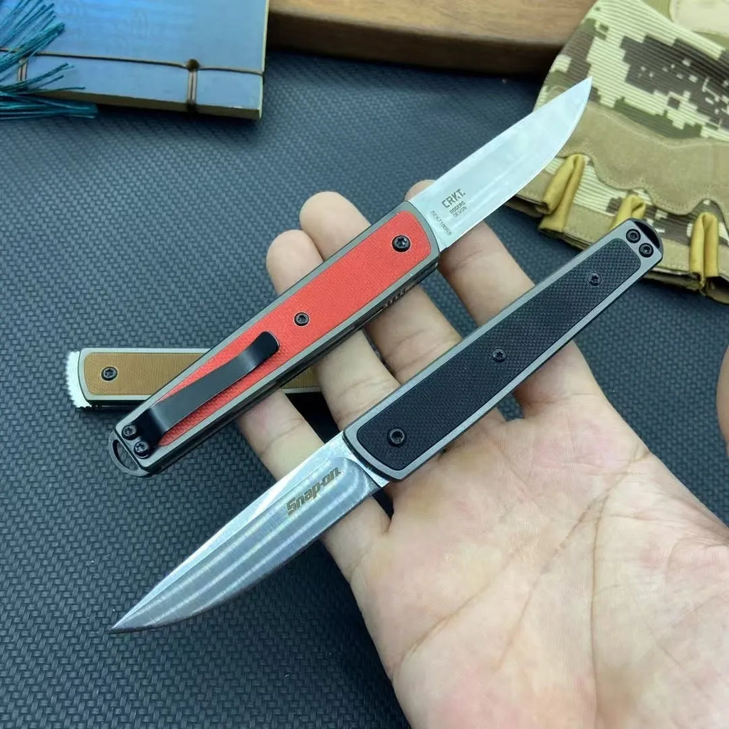 Folding fruit knife with stainless steel blade in black, red or coffee colour options, shown open to 17cm total length