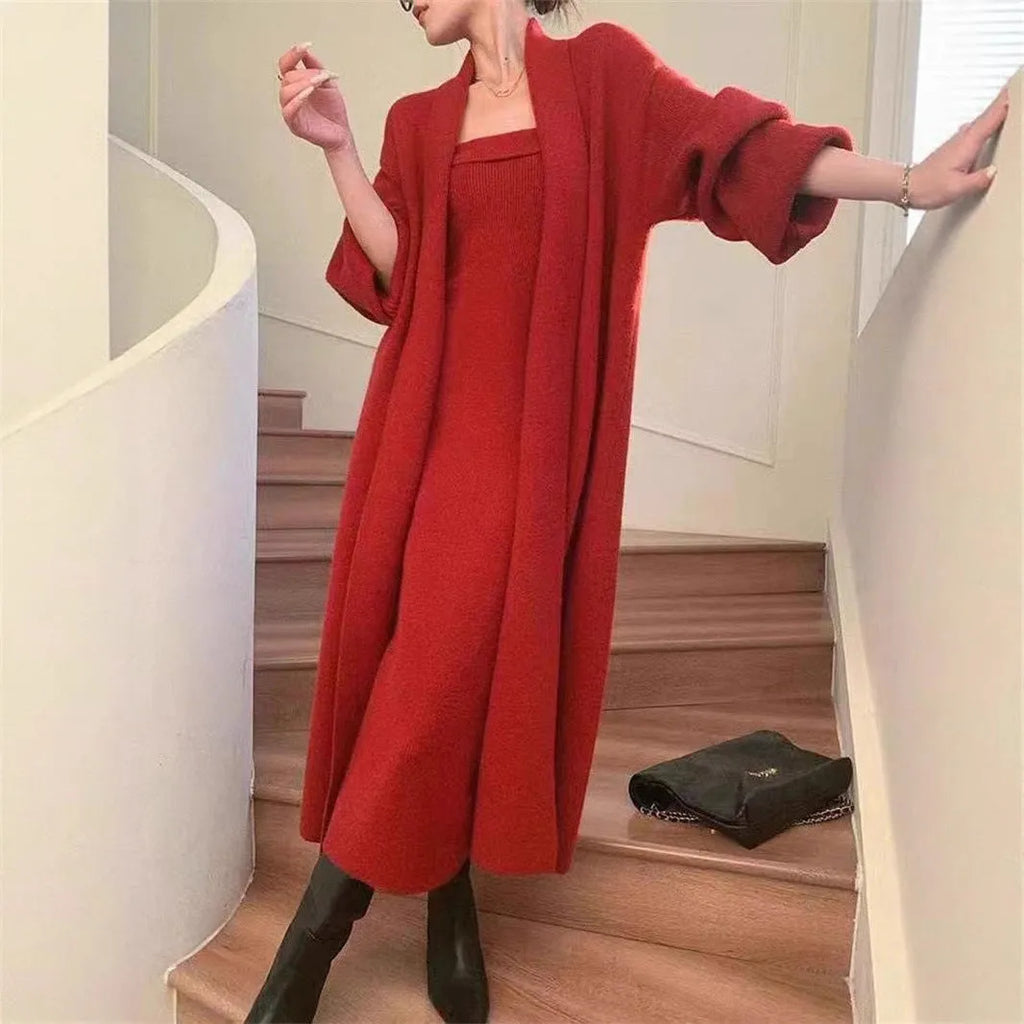 Women's grey knitted cardigan dress sweater suit two piece set with long skirt and regular sleeves.