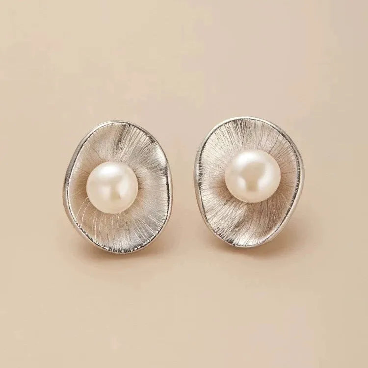 Pearl sterling silver needle earrings with electroplated gold finish geometric design