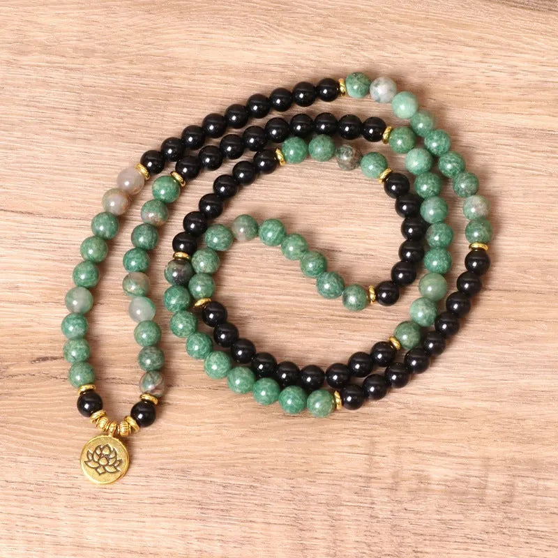 Green and black elastic beaded long bracelet with alloy components