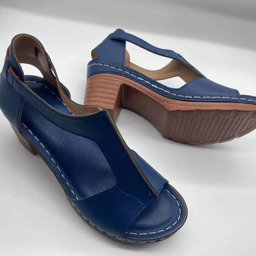 Women's white peep toe wedge sandals with Roman style buckle and low heel