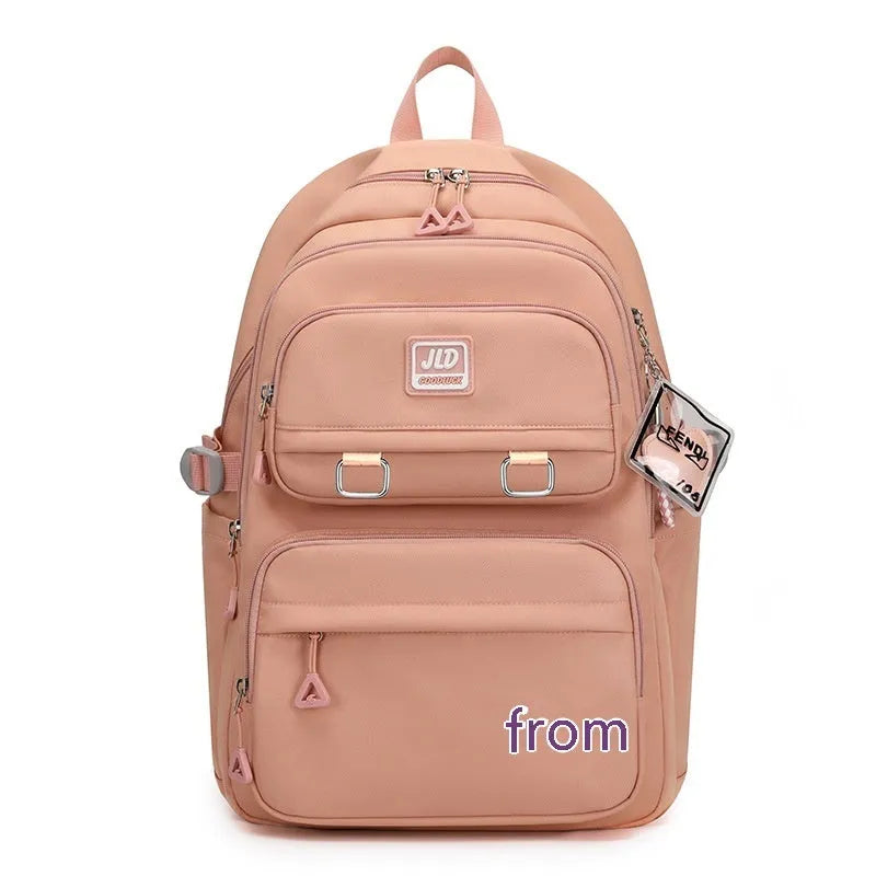 Girls' large capacity waterproof school backpack with physiological curve backplane in multiple colour and pattern options