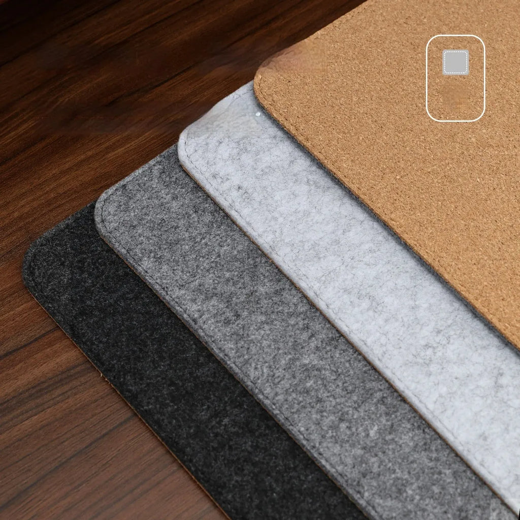 Oversized grey felt cork desk mat with non-slip backing shown on office desk
