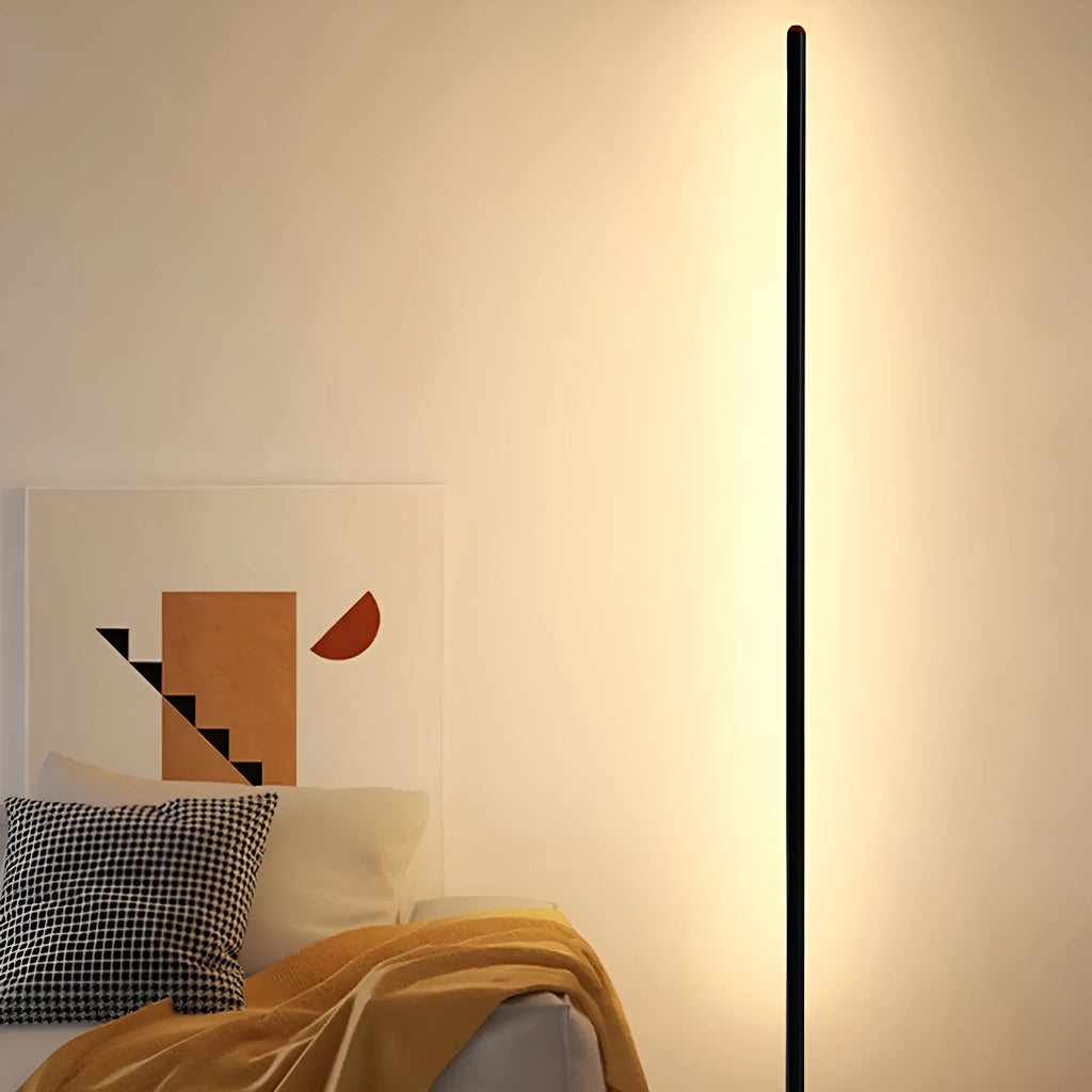 A tall, vertical aluminium alloy floor lamp with a modern design on a simple base.