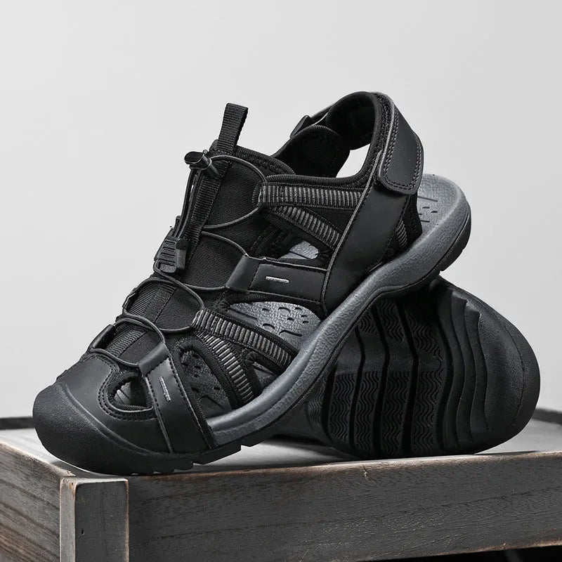 Men's blue and black mesh sports shoes with Velcro strap and rubber sole.