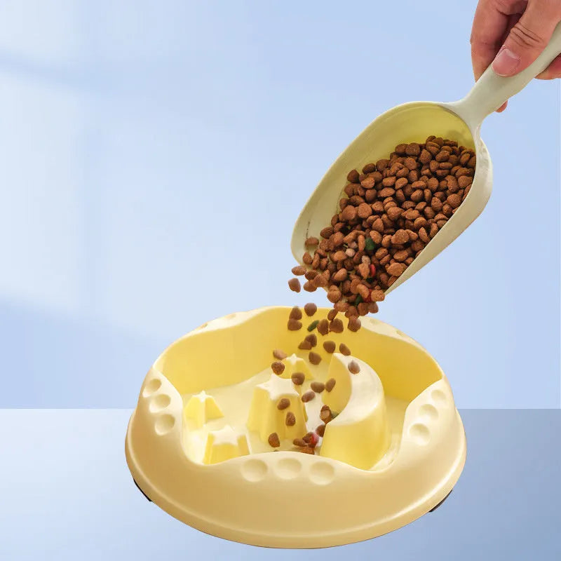 Blue star and wings design large plastic slow feeder dog bowl with maze pattern.