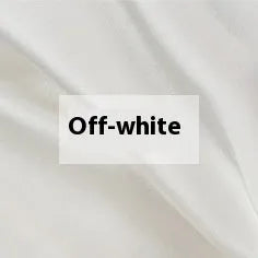 Double-sided silk duvet cover in bright brown colour, shown on a bed.