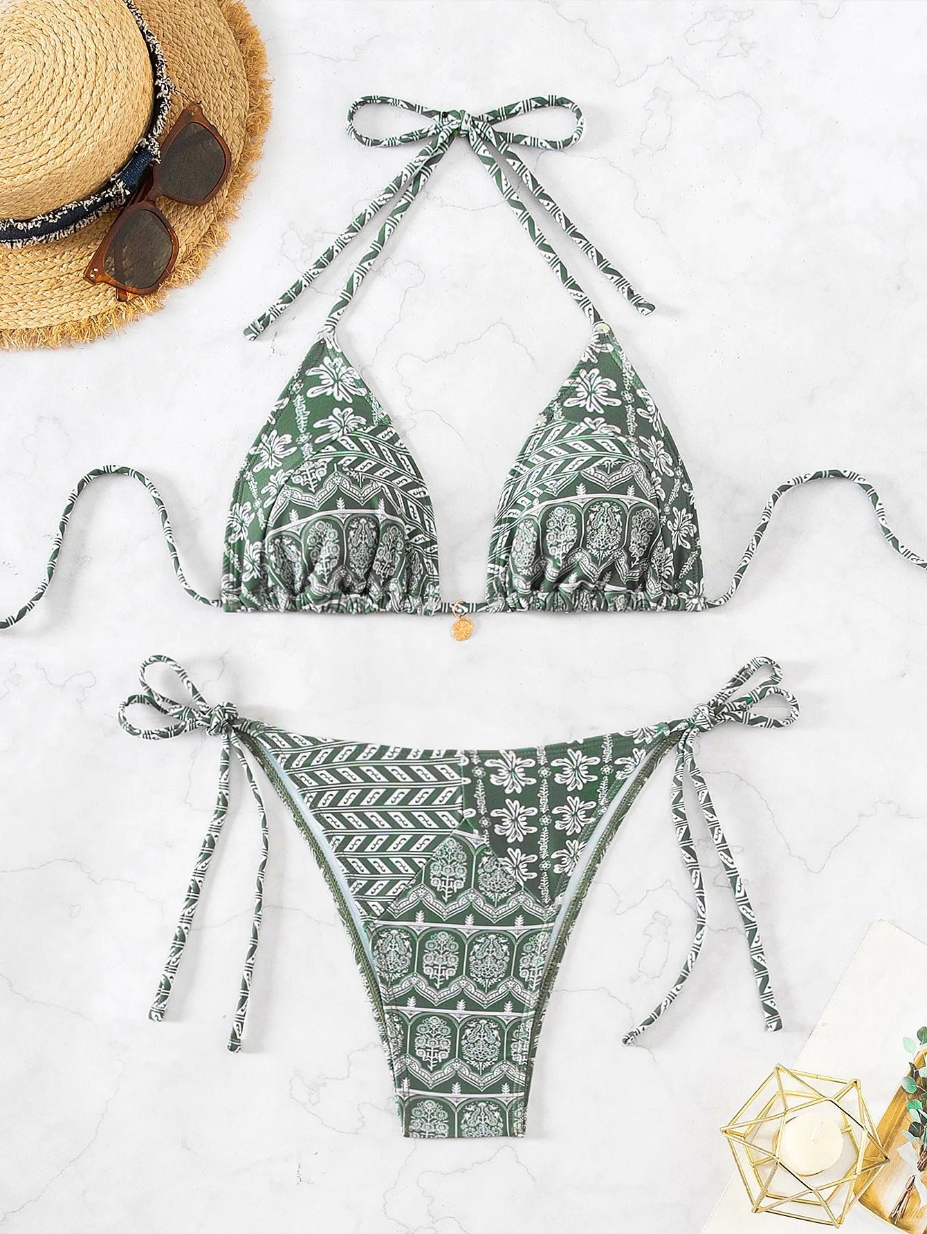 Women's green split bikini swimsuit with bandage stitching detail and polyester construction