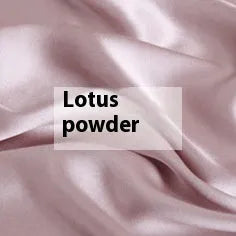 Double-sided silk duvet cover in bright brown colour, shown on a bed.