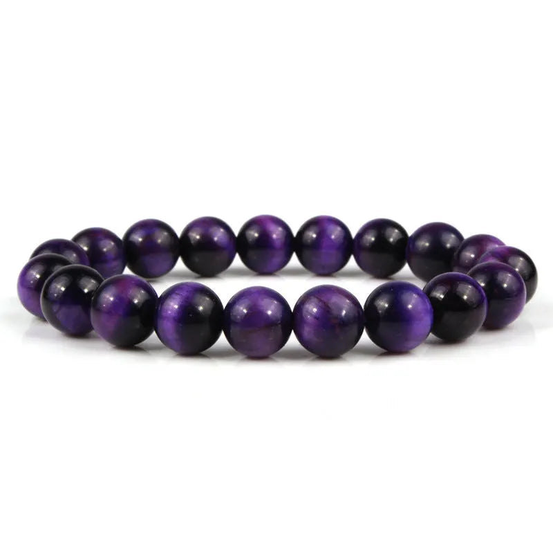 Natural tigereye crystal bracelet with geometric round beads showing colour and size options.