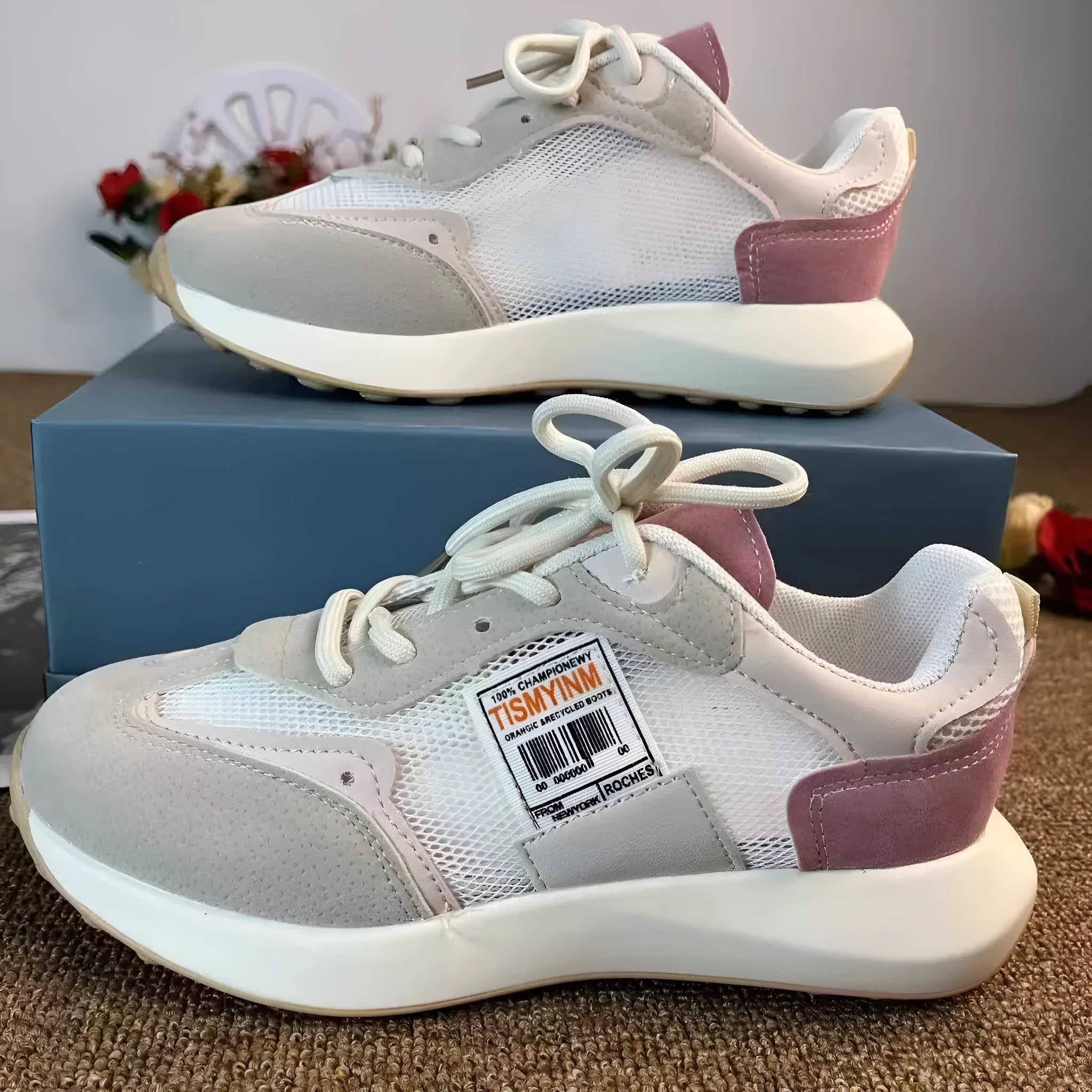 Women's grey and pink low-top retro sneakers with round toe and flat rubber sole